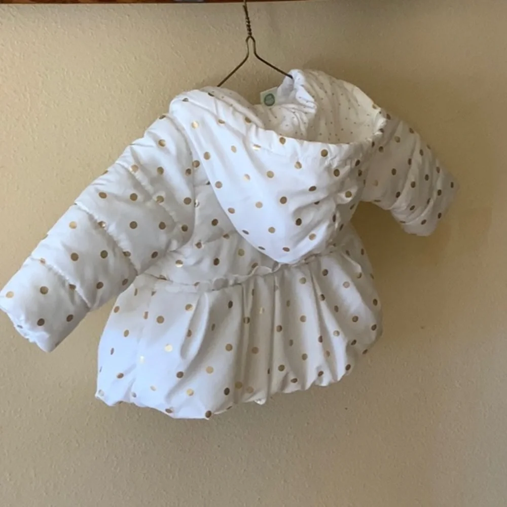 White Jackets with gold circles. Puffy. Like new. size = 12 months